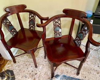 Pair of Oriental corner chairs, with heart shape cutout