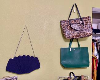 dozens of handbags, all shapes, sizes and fabric, all like new