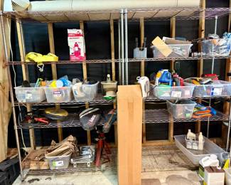 There are 4 of these large chrome shelving units and 1 medium. 