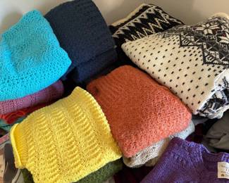 many hand knit sweaters.  also sweaters from Scotland and Ireland