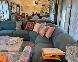 MCM light fixture with teal couch and chair