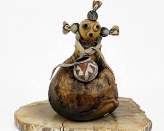 Robert Rivera Mudhead Sculpture with Acoma Pot