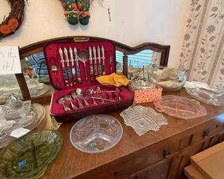 Set of silver plated flatware in case, crystal and glass serving dishes, Several pieces of Cape Cod Crystal