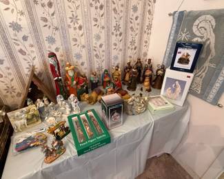 More Nativities, underneath the cloth is a folding table also for sale