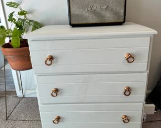 wooden chest of drawers, vintage style radio and music player
