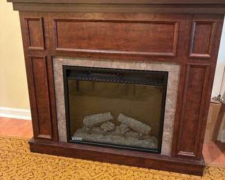 Modern new electric Fireplace and LG flat screen TV