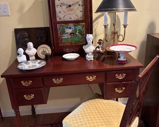 Kneehole desk and chair with sm Parian busts, lamp