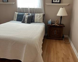 Bed , night stand. Lamp