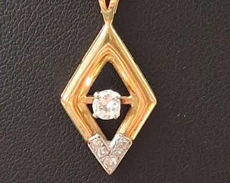 14k Gold And Diamond Pendant With 14k Gold Chain