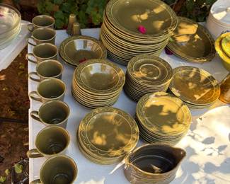 green Hornsea Heirloom pottery plates, cups, and bowls