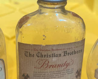 Lot 50: 4 mini alcohol bottles 1920s or 30s Ron Rico Haig & Haig