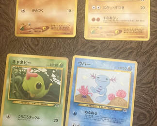 Lot 153: 4 Neo-discovery Japanese Pokemon Cards Mint