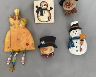 Lot 114: Assorted whimsical pins Glenda the Good Witch and Snowmen 