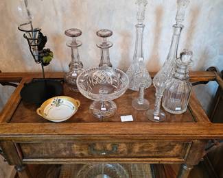 Side server cart with crystal decanters and wine dispenser 