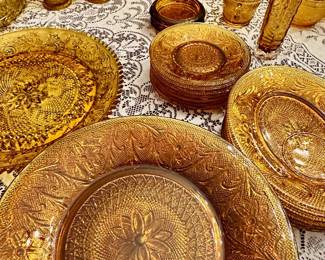 Collection of various vintage amber glassware.