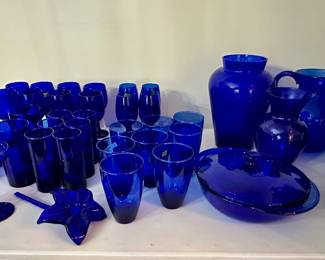 Collection of cobalt blue glassware.