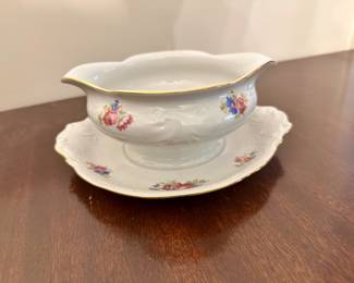Gravy boat with attached platter  in a spring flowers pattern from Walbrzych factory in Poland.
