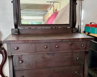 Antique American Empire dresser with mirror.