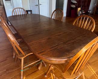 Double pedestal table with leaves and chairs