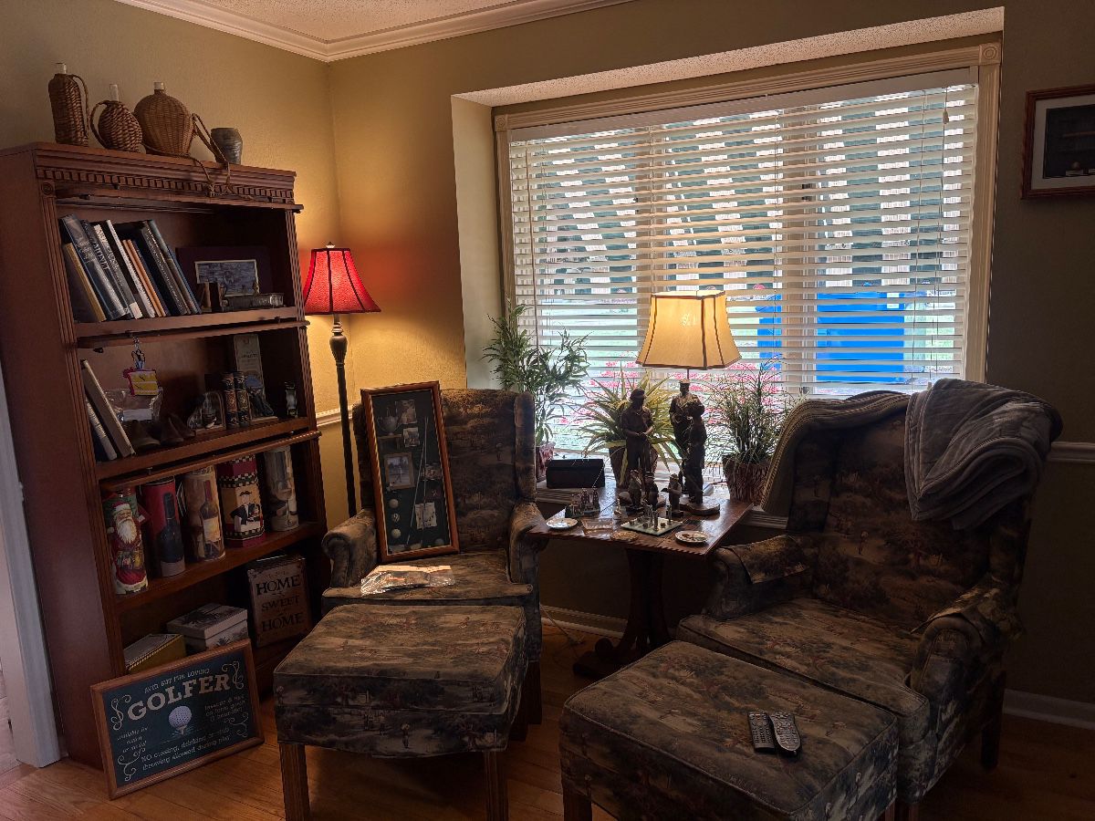 Golf themed reading chairs with matching ottomans - bookcases