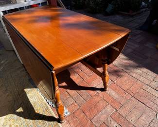 Drop leaf table needs some TLC but leaves pull out with major supports add 24” on each side to 25 inch depth as folded, to