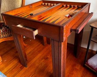 Game table shown open has two drawers and two pull out shelves