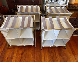 Luggage holders with four sections and there are four of them and they are brand new