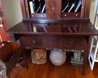 Lovely mahogany disc shown open with top piece folded out on support over two drawers side cabinets, accordion doors rolled open and intersection door with elaborate inlay open a tad