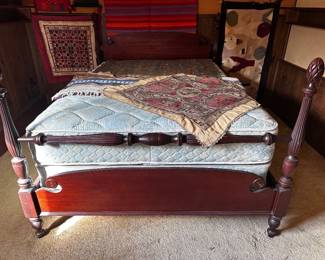 Full size or double bed with or without mattress and boxspring in good condition, pineapple style headboard, and footboard mahogany