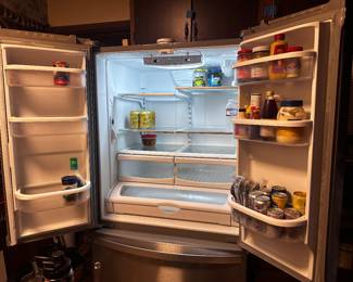 Inside of refrigerator, nice and new and clean with great adjustable controls and extra filter