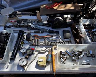 Socket sets, come-along, scale,