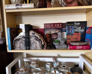 Petrified wood book ends 7 inches wide by 8 inches tall and 2 inches thick, agate bowl, reference books