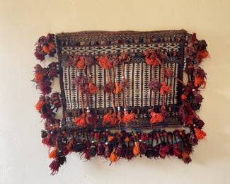 Complete Camel bag shower hung on wall is 36 wide by 26 tall needs bottom tassels reattached in places