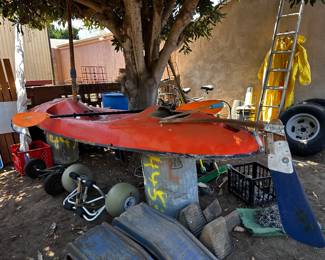 One of a kind Kayak/sailboat combo, with paddle, sail, mast, etc.
