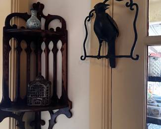 Carved wood corner shelf and hanging metal bird on stand with removable backpiece
