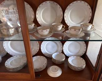 Set of dishes is B and C France. Limoge’s includes eight of most pieces plus extras of some.