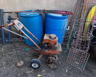 Rototiller, Water barrels, tomato cages
