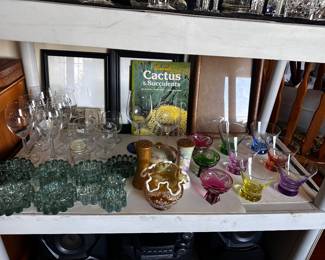 Colored glassware plus set of wine glasses plus fancy glass, etc.
