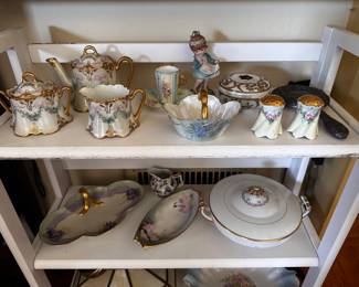 Hand painted porcelain teapot, cream and sugar with no marks, Dima test cup, and saucer of Limoge dresser jar, custom painted, and covered casserole dish is Noritake goldcroft 