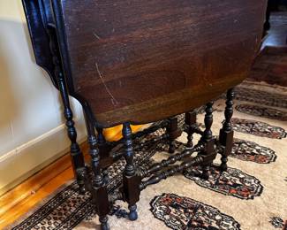 Sweet drop leaf small table is 9” x 18” when closed as ahown