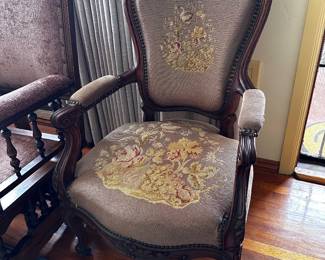 Needlepoint seat and back on lovely wood carved armchair