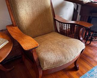 Oak armchair with 4 1/2 inch wide arms and gold velvet, teen tapestry very stately