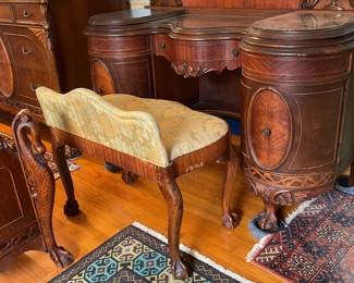 Bench for vanity is 26 wide and 16 deep four claw on ball feet note some veneer chipping on side