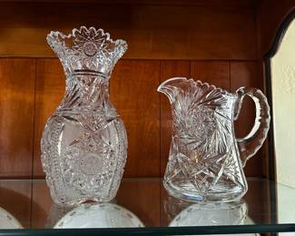 Cannot tell from picture but brilliant, cut, crystal pitcher and vase