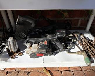 Auger with loads of bits, craftsman belt sander,