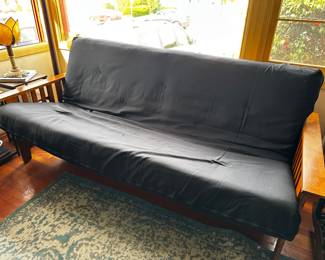 Futon easily adjusts to a bed is 82” wide and 36” deep as shown