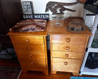 Pair of end tables or nightstands with three regular drawers and lower file drawer fabric on top plus ethnic carving pottery bowl glass cake stand