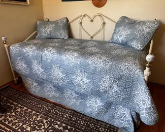 Daybed ass found with comforter set on top and one below