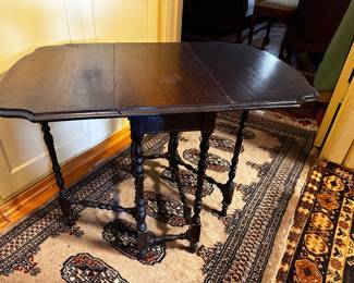Small walnut drop leaf table is 18 x 28” when opened