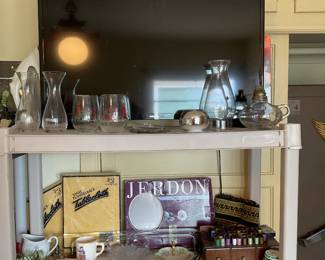 Samsung 32 inch television, wall mount magnifying mirror, hand, painted dishes, Campbell kids antique child’s dish